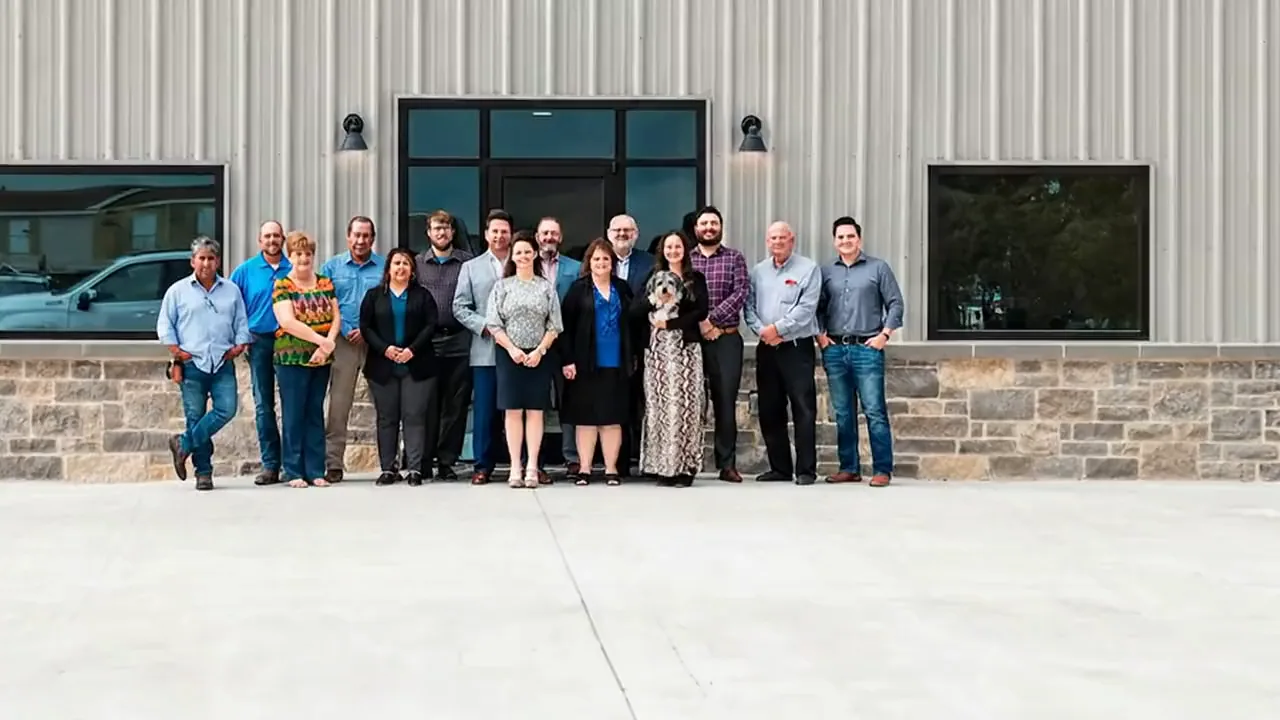 The Chris Harp Construction team outside the company shop in Nevada, Texas